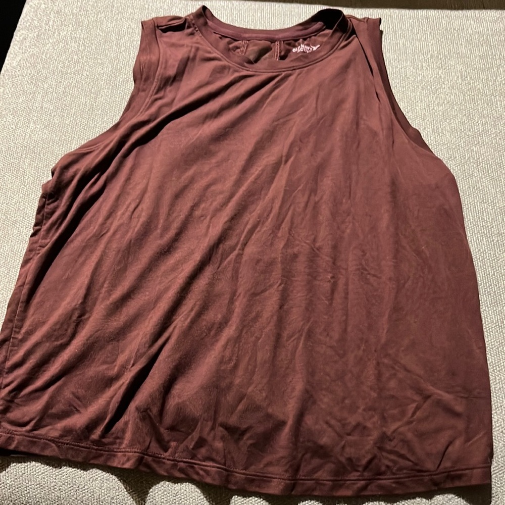 Burgundy athletic tank top with mesh panel down back